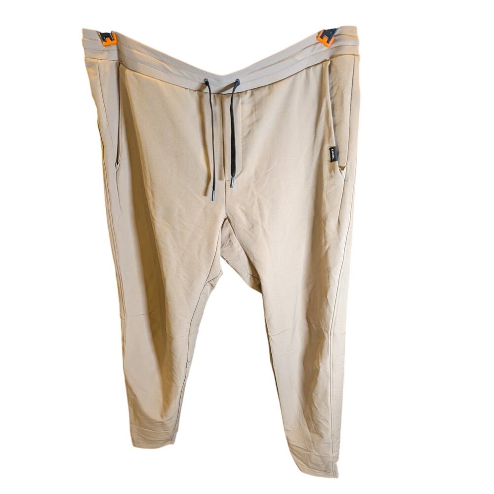 UNRL Mens Large Performance Jogger Pants Tan Stretch Athletic Travel Zip Pocket